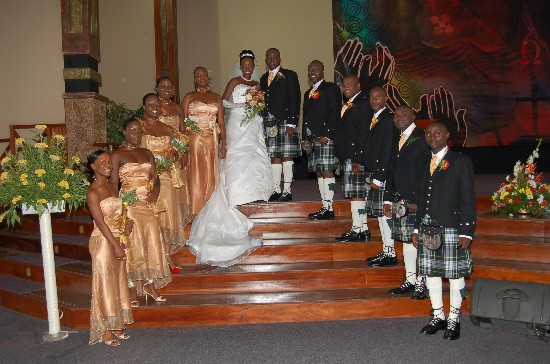 The bridal team was resplendent with the groom and groomsmen dressed in Scottish kilts