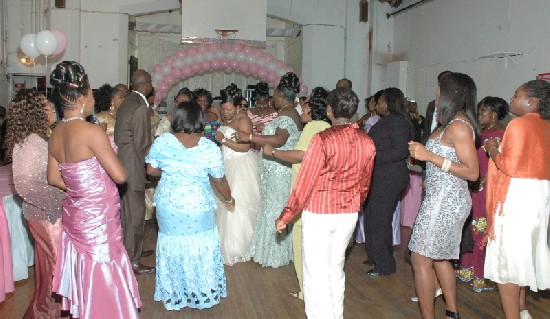 The couple and well-wishers on the dance floor