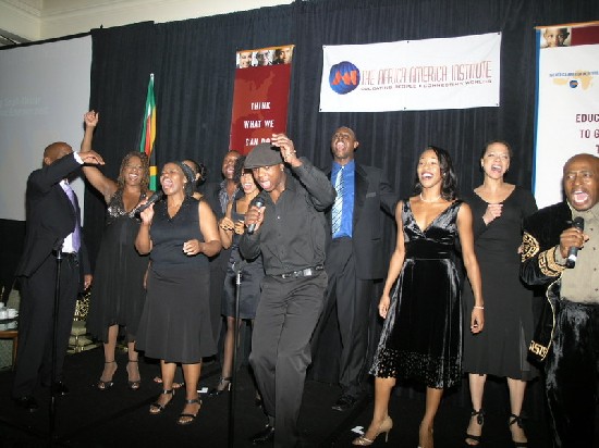 South Africa music group sung in their native language in honour of President Mbeki.