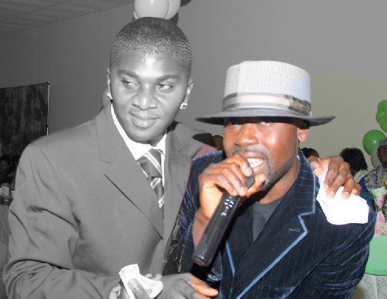 Hiplife artiste, Kwesoul (right) briefly performing in honour of the couple.
He was introduced by Papa Linc (left)