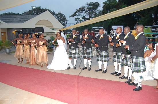 Popping champagne at the wedding reception