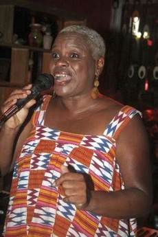 African American Toni Manieson sings at the Jazztone bar in Accra November 18, 2006. In African dress and with dyed-blond cropped hair, she croons and sways in the bar she owns in the town she has made her home: Jazztone in Accra, the sweaty oceanside capital of the West African country of Ghana.