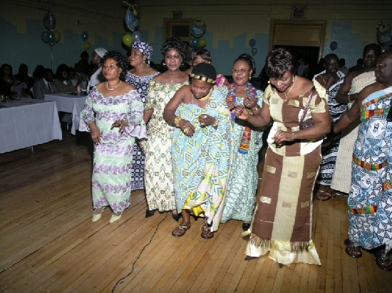 Nana Ababio, NY Asantefuohemaa (center) danced to congratulate the couple