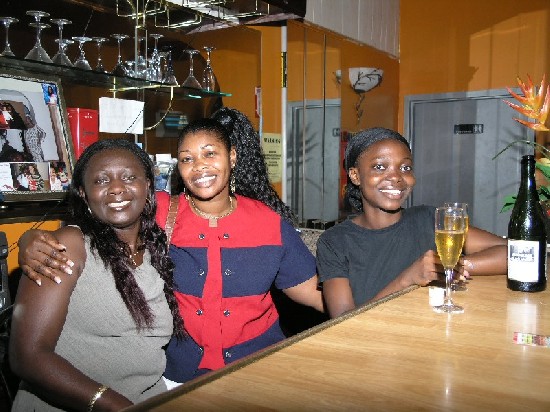 Nana Ama posed with a client (middle) and Ellen (her protégé and an honor roll student in New York)