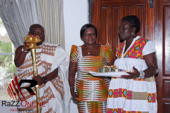 Oyiakehyire Nana Ansah Kwao IV performs the knocking ceremony of Gifty Anti