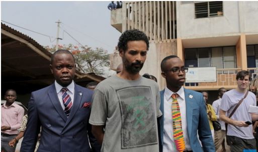 Arthur Simpson-Kent (C), who is wanted over the murder of a former EastEnders actress and her two children, leaves a district court after a remand hearing in Accra, Ghana January 12, 2016. REUTERS/Francis Kokoroko