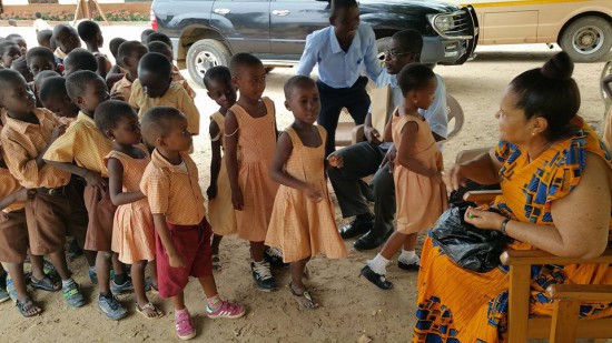 Menaye's mother interacting with the children