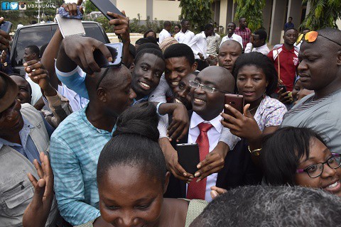 Students exchange greetings with Dr. Bawumia