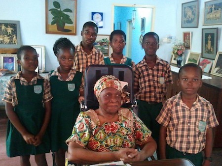 Theodosia S. Okoh visited by school kids