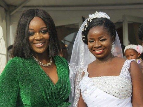 Actress Jackie Appiah  smiles beautifully with bride