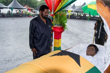 Mr. Oko Vanderpuije paying his last respect to Madam Theodosia Okoh