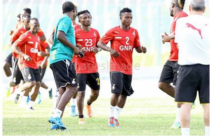 Grant and his assistant Maxwell Konadu keep an eye on new boy Evans Mensah