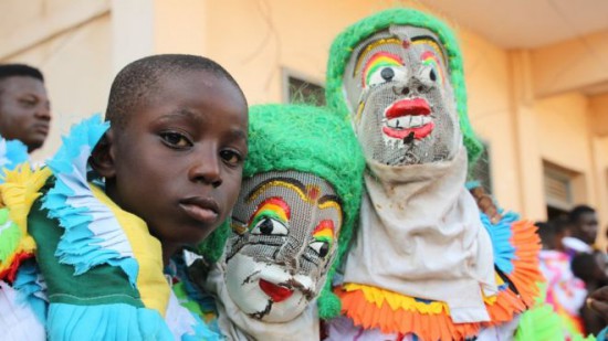 Traditional Raffia masks are facing competition from Western-style masks, which some people prefer because they are 