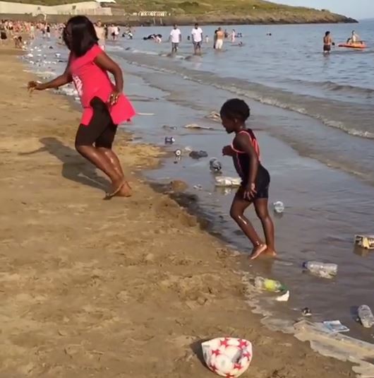 Emelia Brobbey with daughter at Barry Island beach