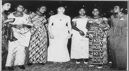 At a reception at the Osu Castle. Wives of top civil servants with the first lady, Madame Fathia Nkrumah. I Theodosia Okoh dressed in kente to the right of Fathia, in the center in 1965.