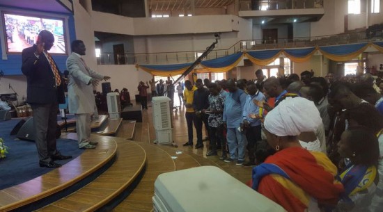 Bishop Agyin Asare praying for the Hearts team