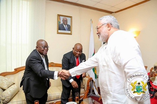 President Akufo-Addo shaking hands with former Jerry John Rawlings