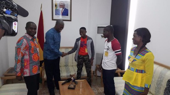 Abraham Attah with his parents (right)