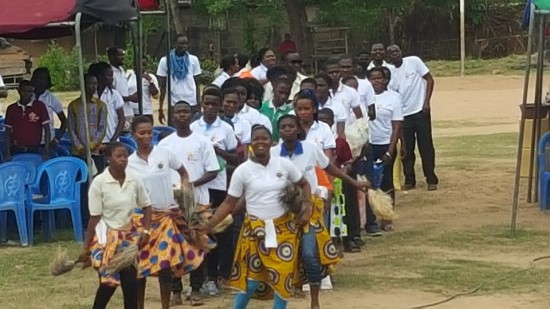 Kpehe youth performing local dance