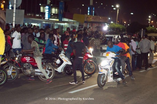 Shatta Movement on their motorbikes at the airport.