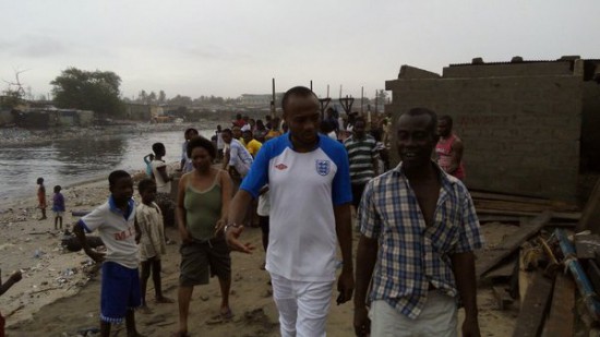 Jerry Ahmed (left) and an elder in Ablekuma South touring parts of the constituency