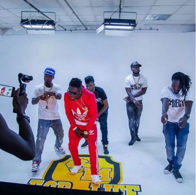 Shatta Wale spotted in fake Adidas hoodie in 'Biegya' video